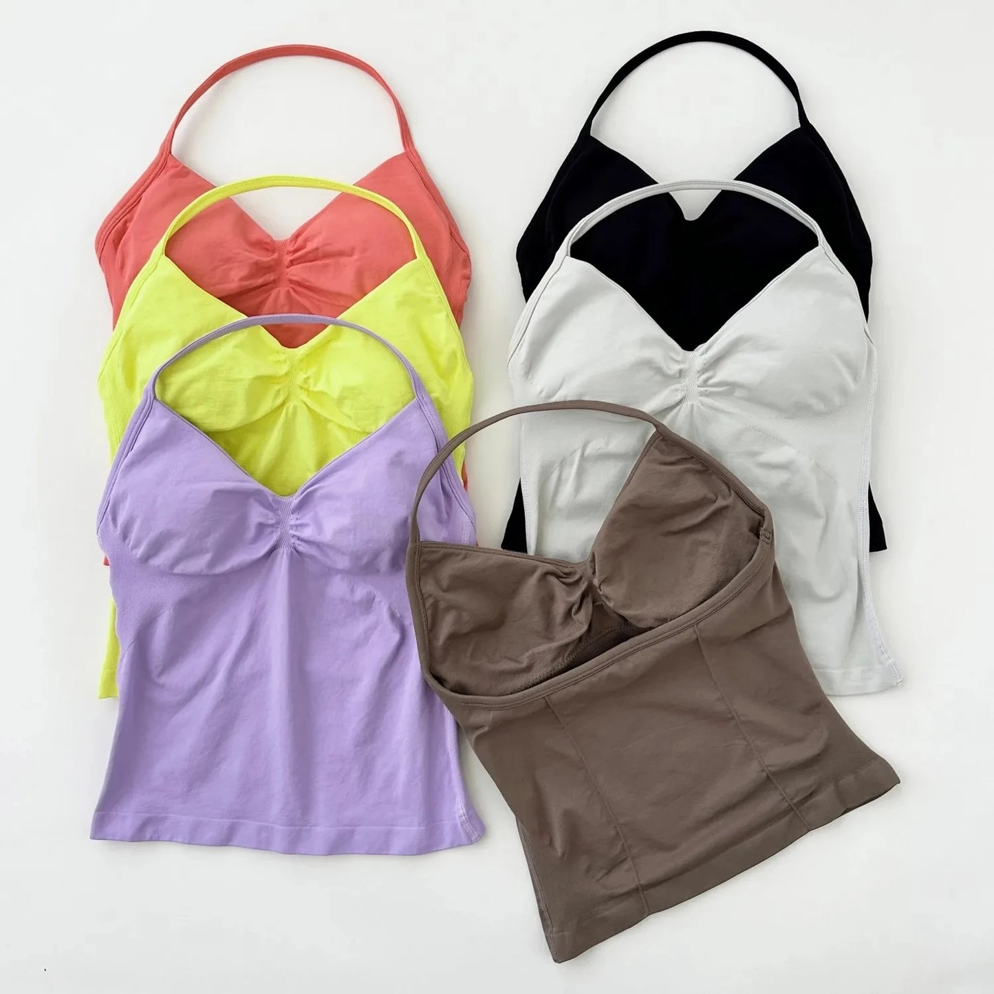 Camiseta Deportiva Sin Costuras para Mujer – Tiras Cruzadas y Cómoda