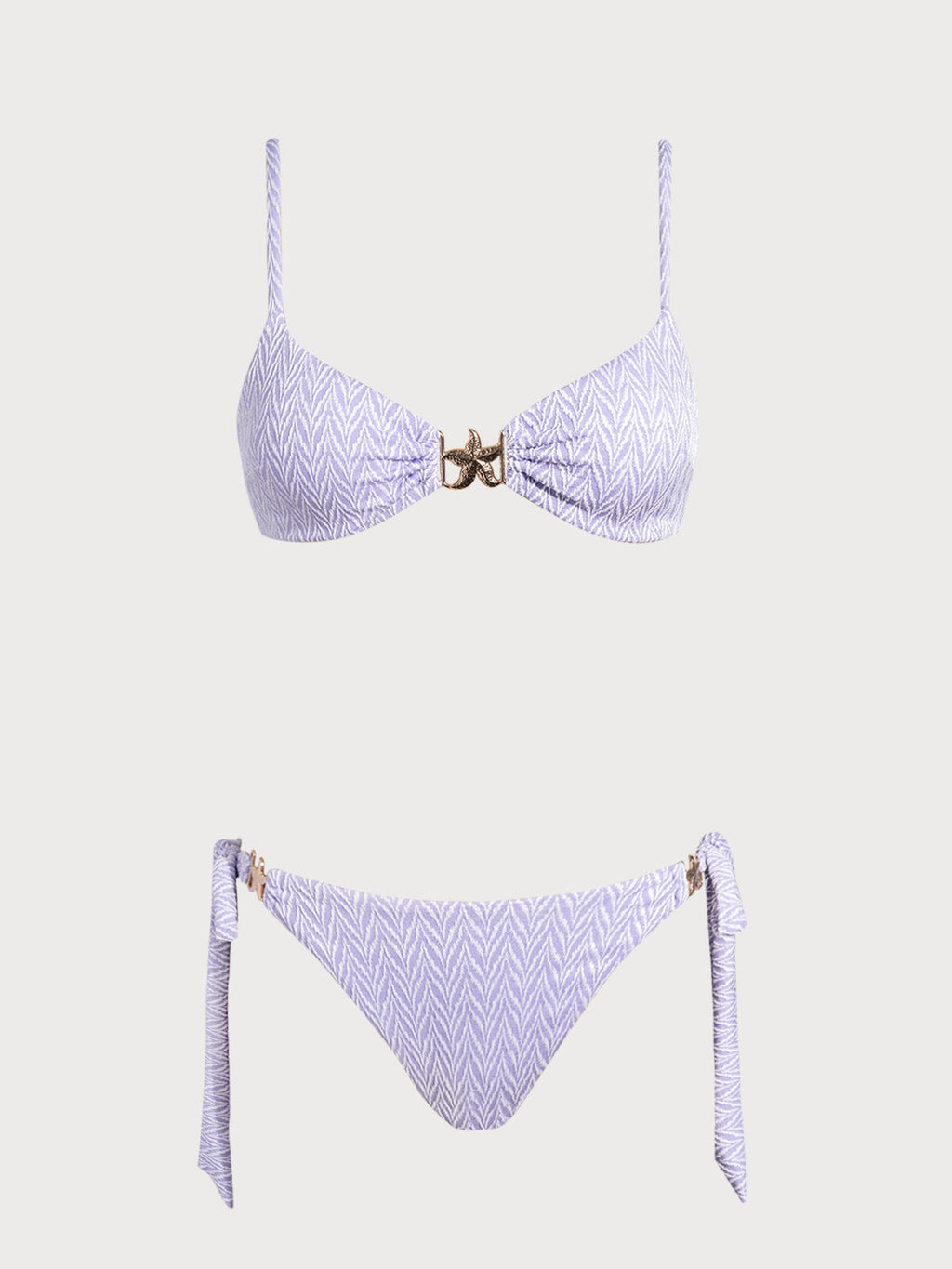 Conjunto de bikini morado con estampado geométrico de estrellas