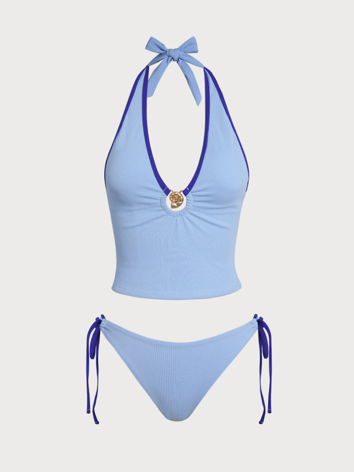 Conjunto de tankini azul con contraste de conchas