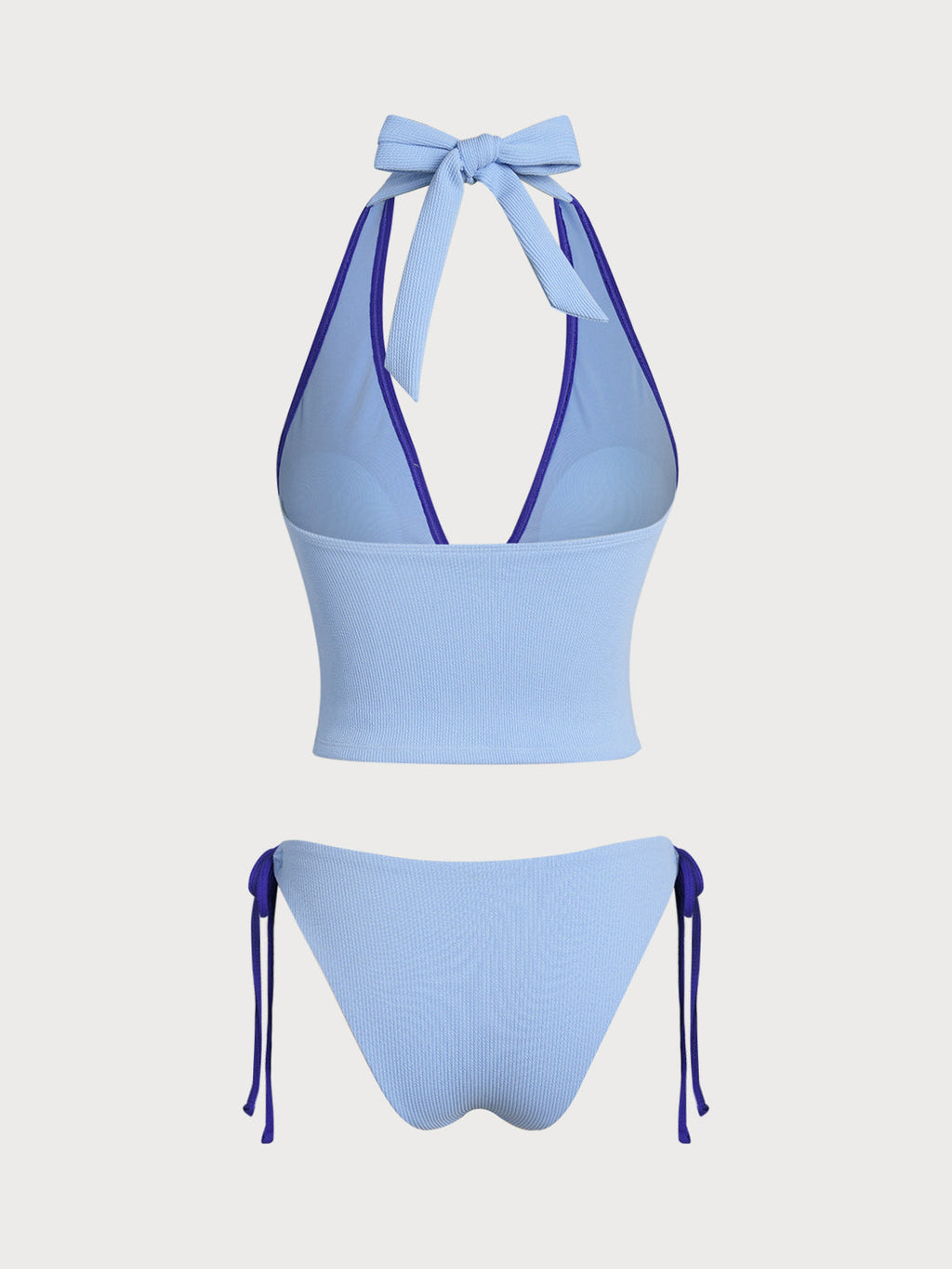 Conjunto de tankini azul con contraste de conchas
