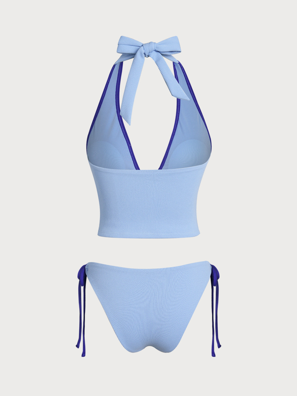 Conjunto de tankini azul con contraste de conchas