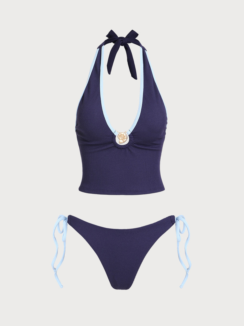 Conjunto de tankini azul con contraste de conchas