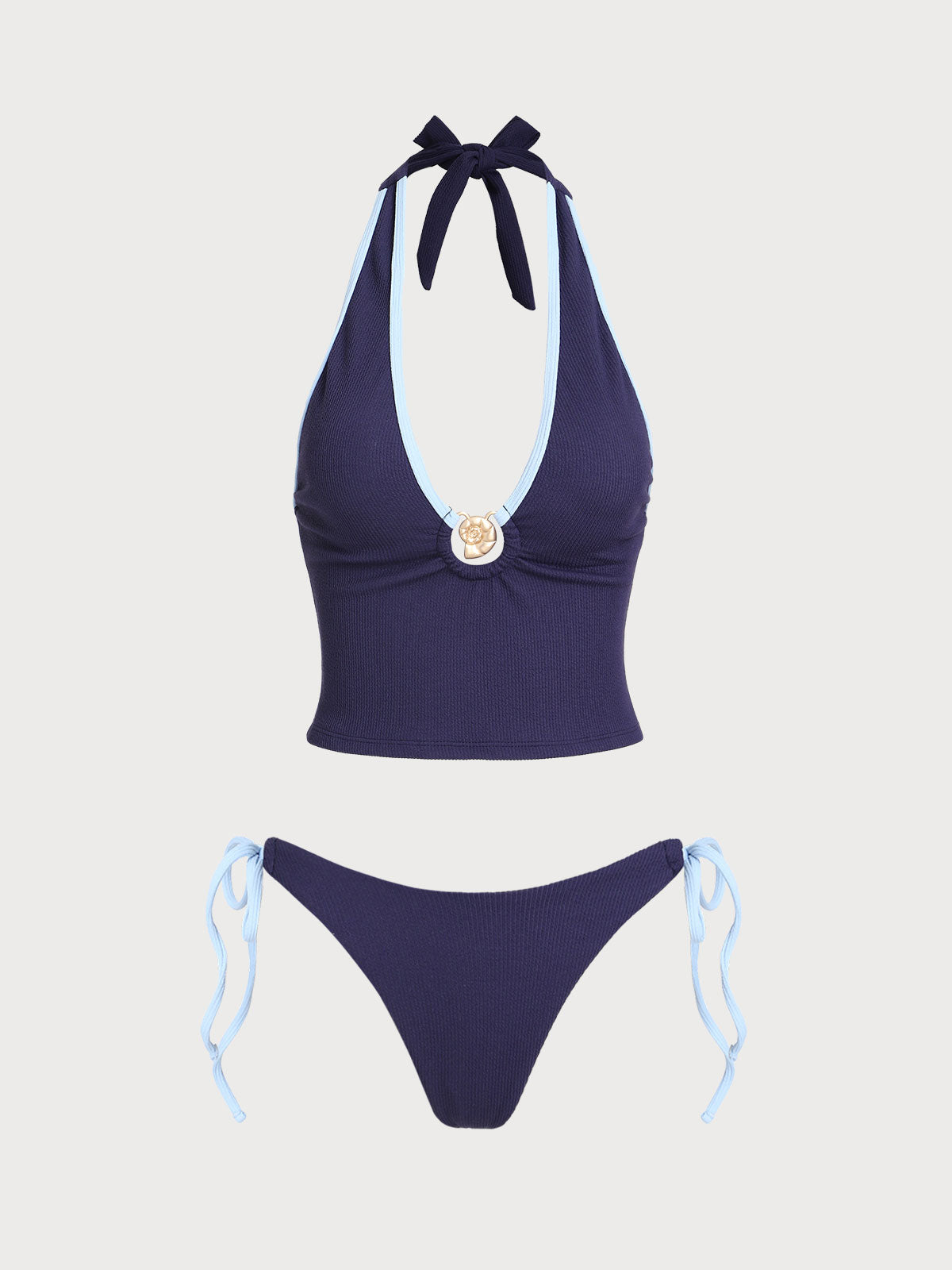 Conjunto de tankini azul con contraste de conchas