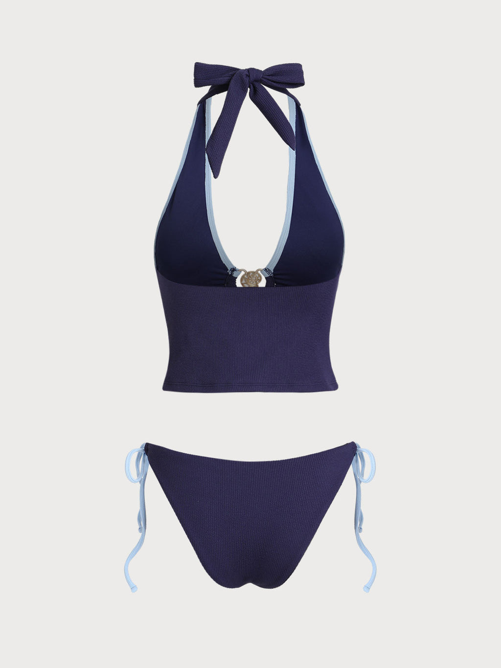 Conjunto de tankini azul con contraste de conchas