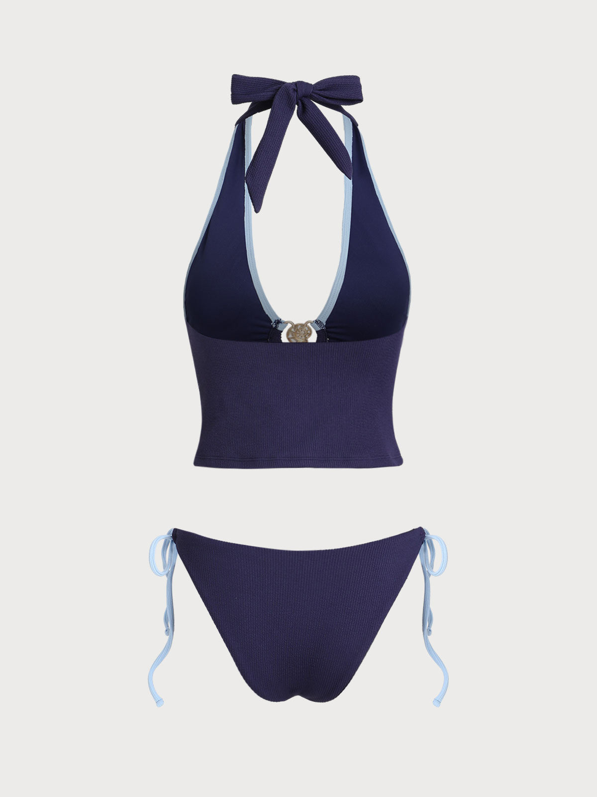 Conjunto de tankini azul con contraste de conchas