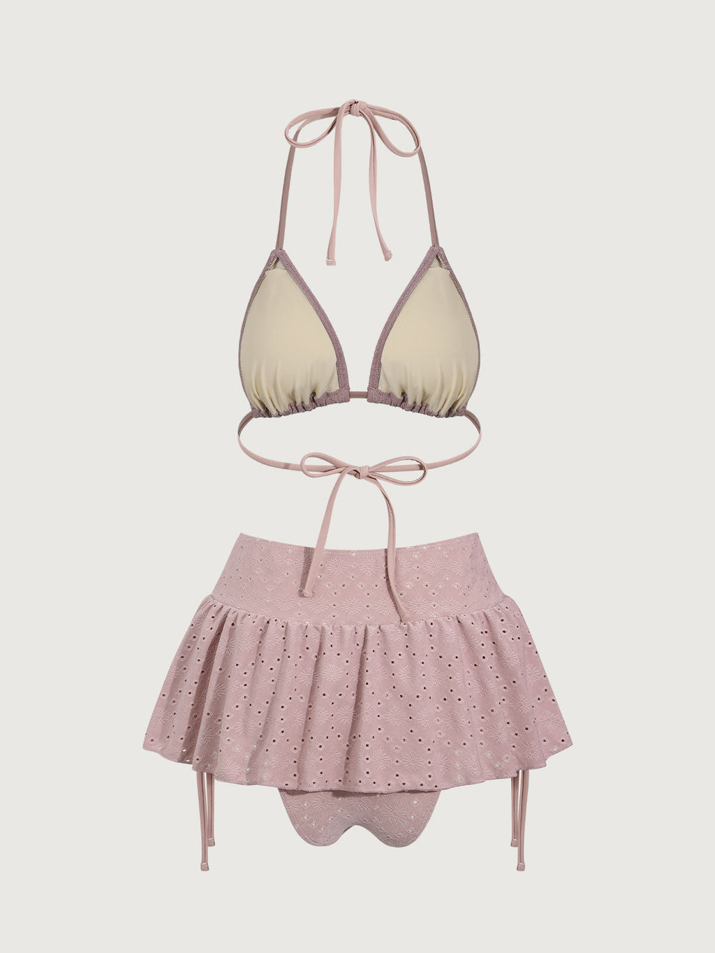 Bikini rosa con volantes y traje de baño de tres piezas