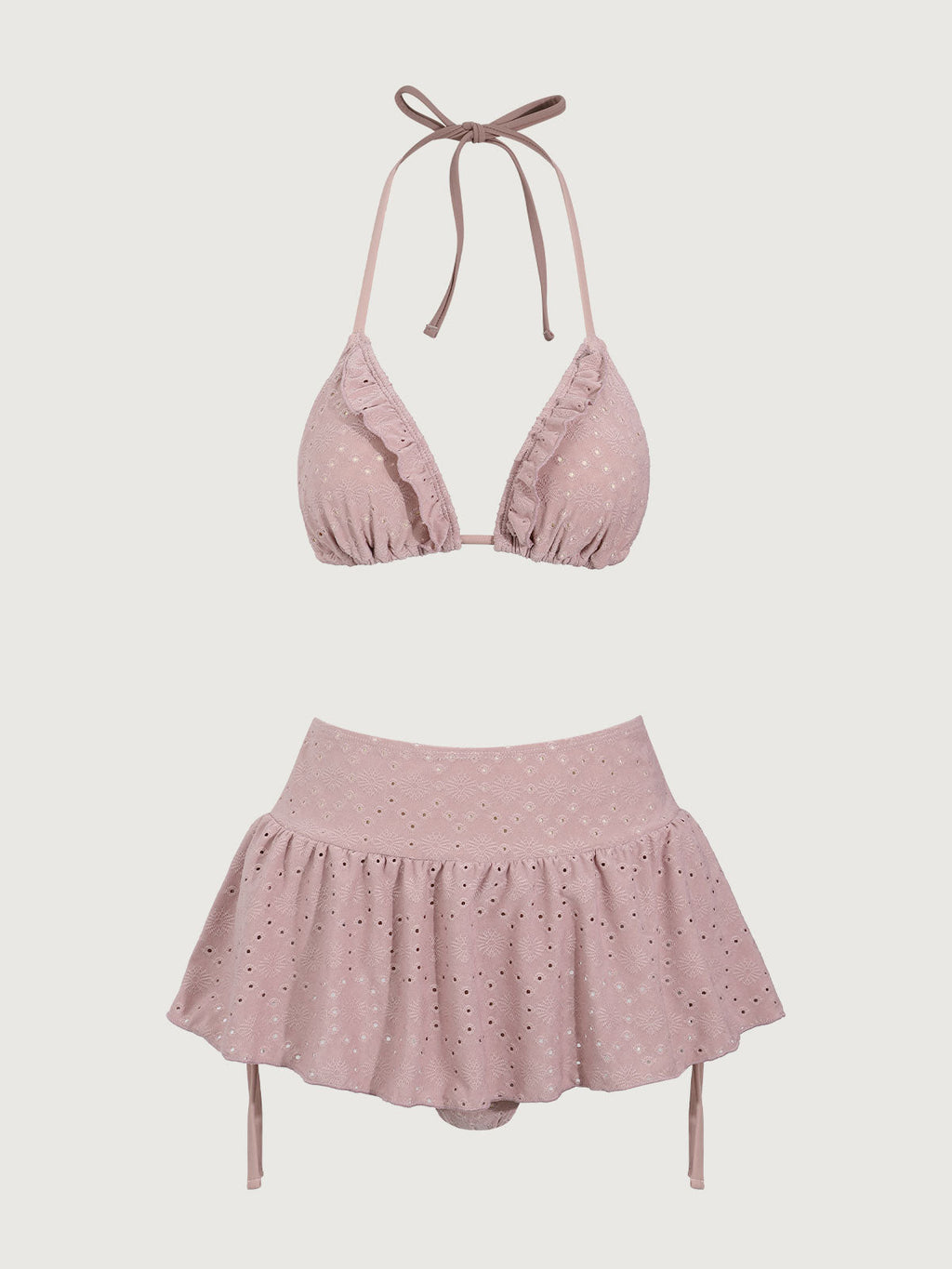 Bikini rosa con volantes y traje de baño de tres piezas