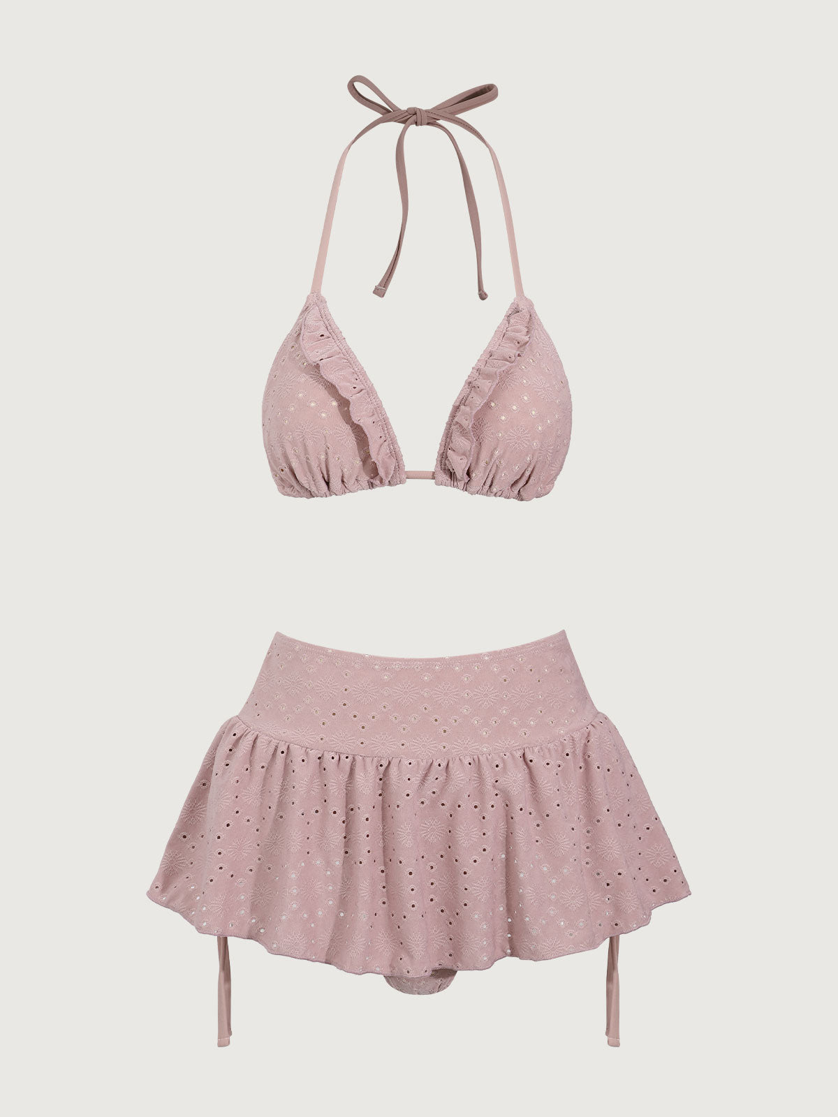 Bikini rosa con volantes y traje de baño de tres piezas