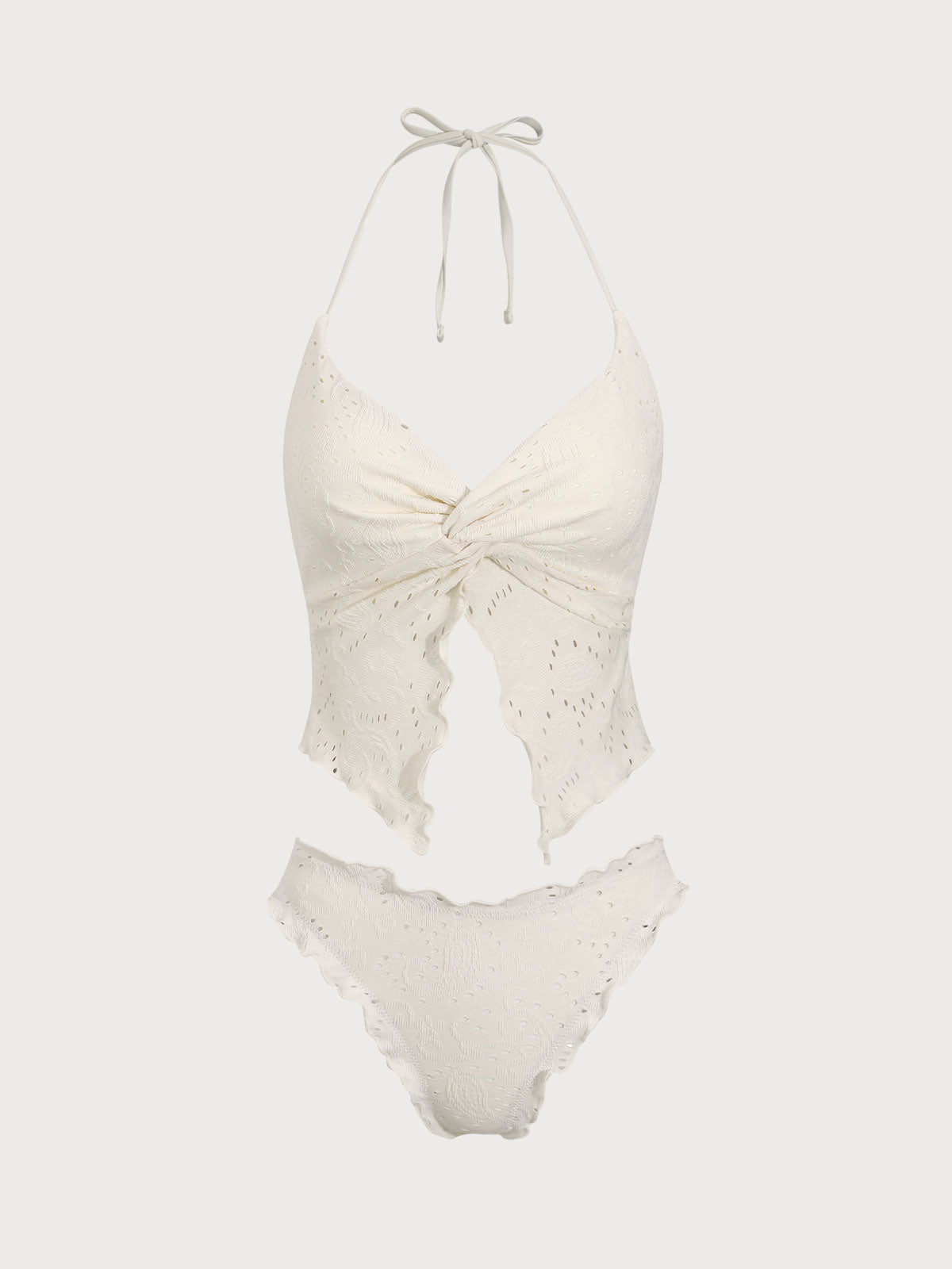 Conjunto de tankini blanco con diseño geométrico retorcido