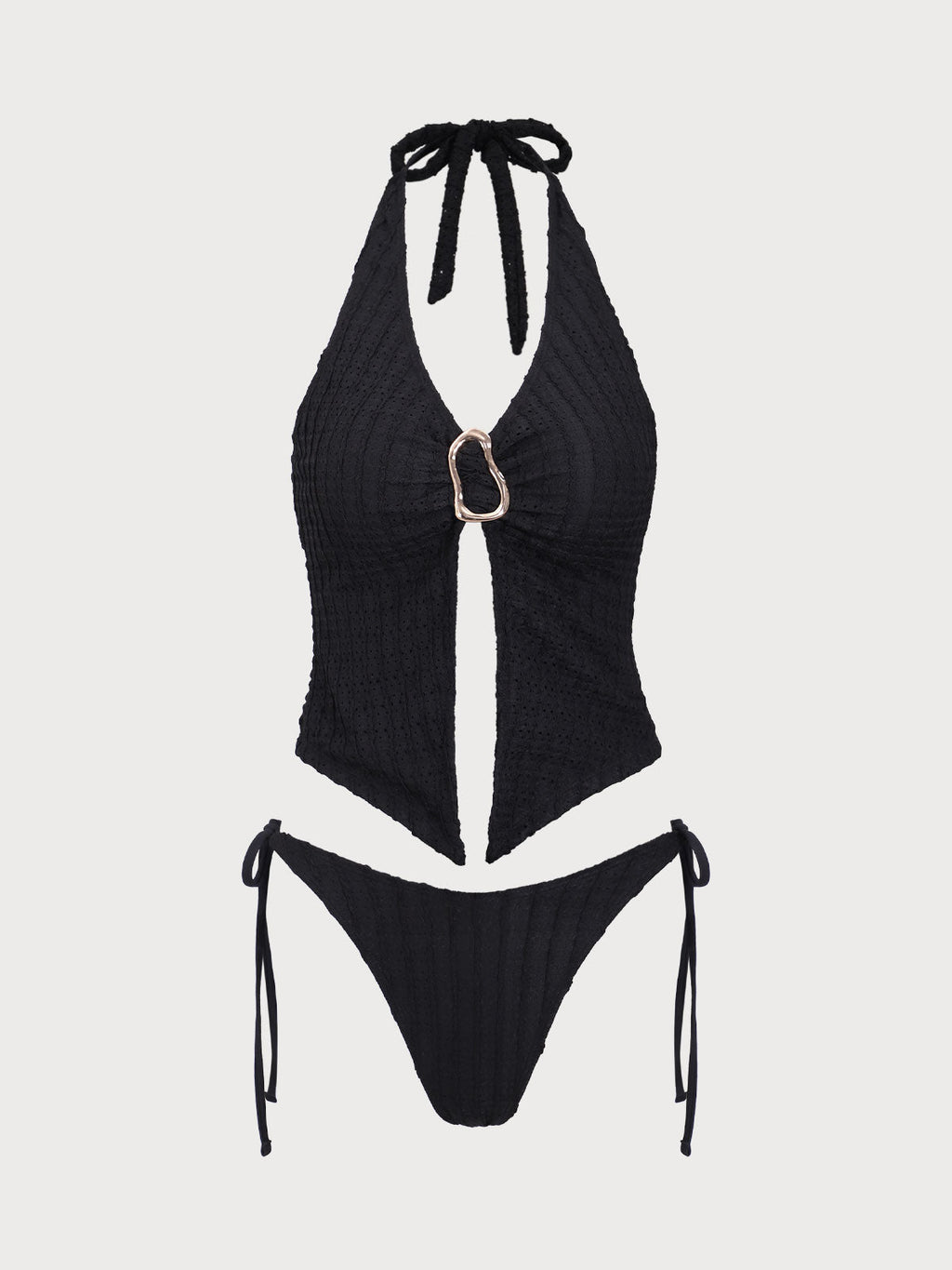 Conjunto de tankini negro con aberturas y estampado jacquard.